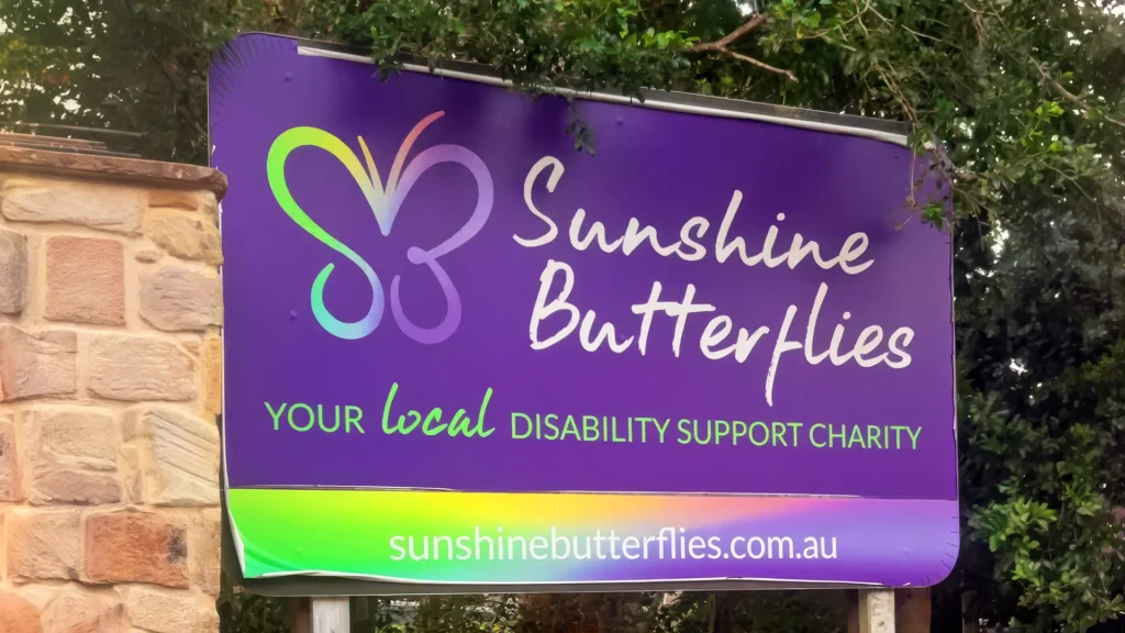 Sunshine Butterflies disability support charity sign in Queensland, Australia.